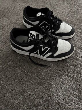 New Balance Black and White Low-Top Sneakers